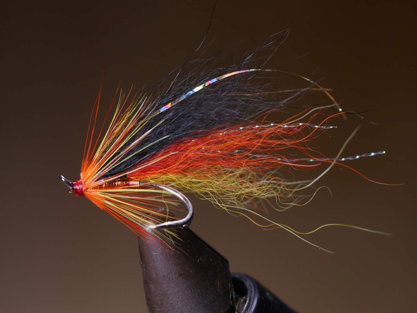 Here's my most deadly weapon salmon fly pattern the Copperass. I built a thriving salmon fishing guide business on the back of this pattern such is its salmon attracting potency. For anyone who would like their salmon fly rod pulled out of their hands here's the correct fly dressing materials;
Hook: 1