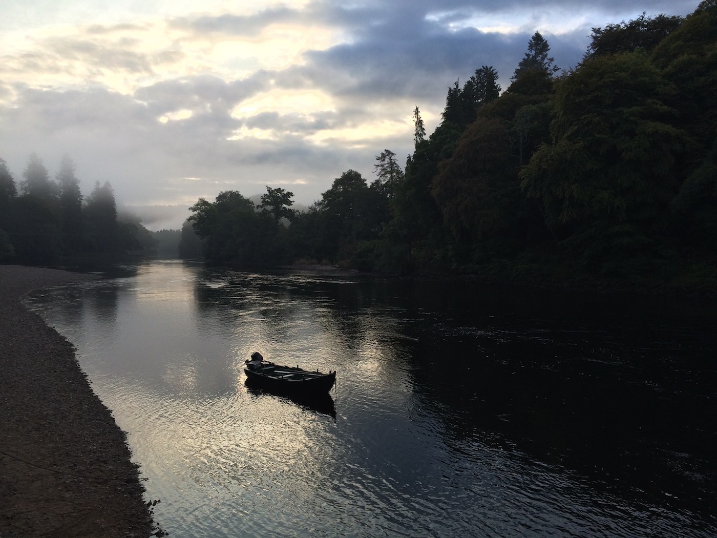 Here's the Dunkeld traditional larch built salmon fishing boat moored up for the night as dusk approaches. The dusk is a magical time of the day to observe a salmon river as the fading light and general calming of the river magnifies your sensory perception.