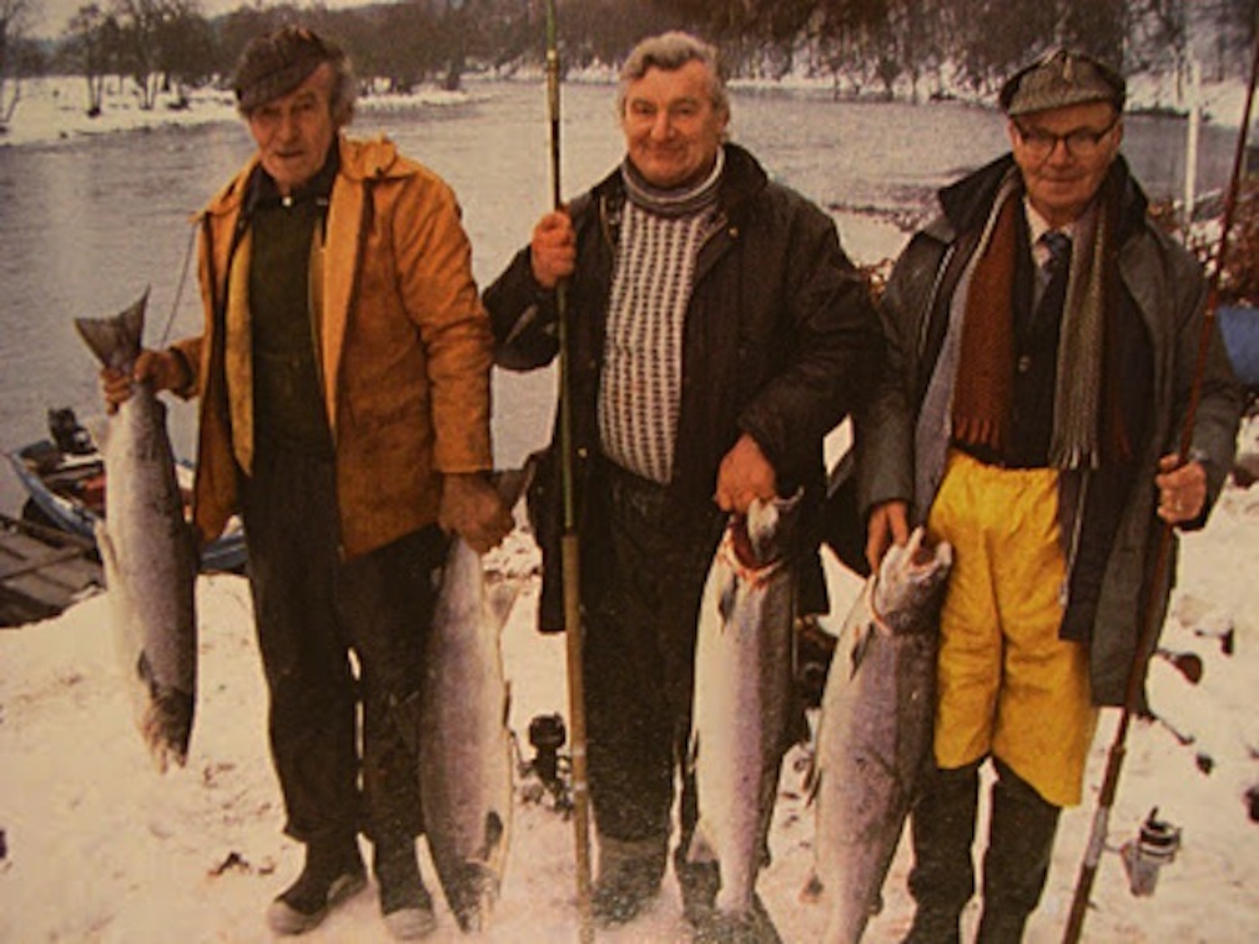 Here's 3 River Tay salmon fishing professional ghillie legends. Willie 'the ghillie' Laird, Ian Redford & Calum Gillies were 3 of the most renowned salmon fishing men in the 70's on the Tay. This was a 15th of January opening day picture taken at lunchtime in front of the Newtyle Beat fishing hut in Birnam.
