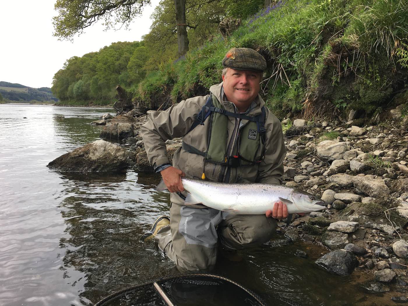 Here's Austrian doctor Fritz Seifert with a the perfect endorsement to his well presented fly. This Spring fish weighed 15lbs and was caught at the March Pool on the River Tay which is directly opposite the mouth of the River Tummel. I took this salmon capture shot as Fritz's salmon guide that day. Many international fishers like to come salmon fishing in Scotland each year.