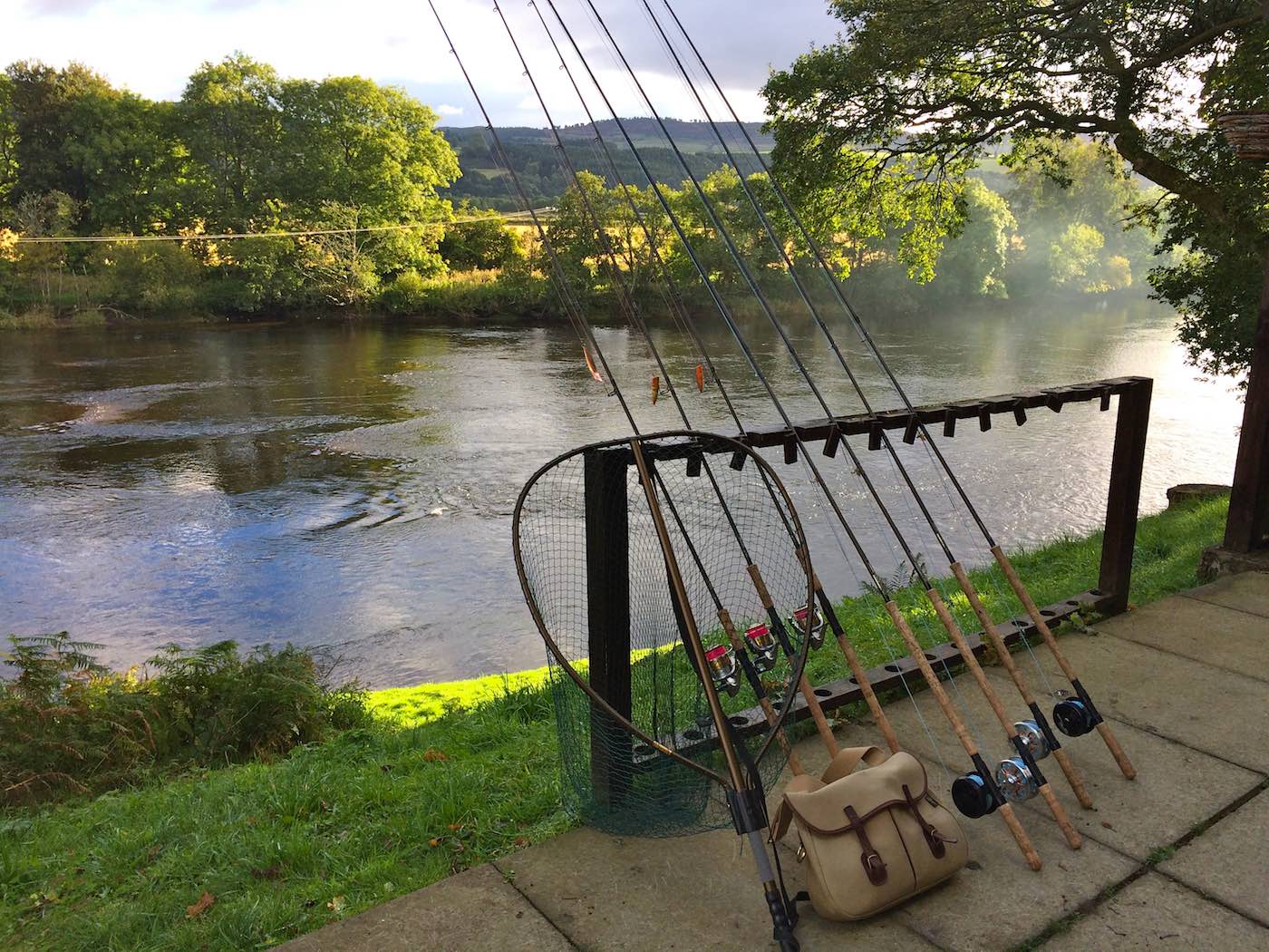 Here's all of the days fishing kit laid out waiting for the fishing guests to arrive on the River Tay near Dunkeld. You can see there's both fly rods and spinning rods in addition to a big McLean salmon landing net and Brady fishing bag full of lures, flies and other important salmon fly fishing accessories.