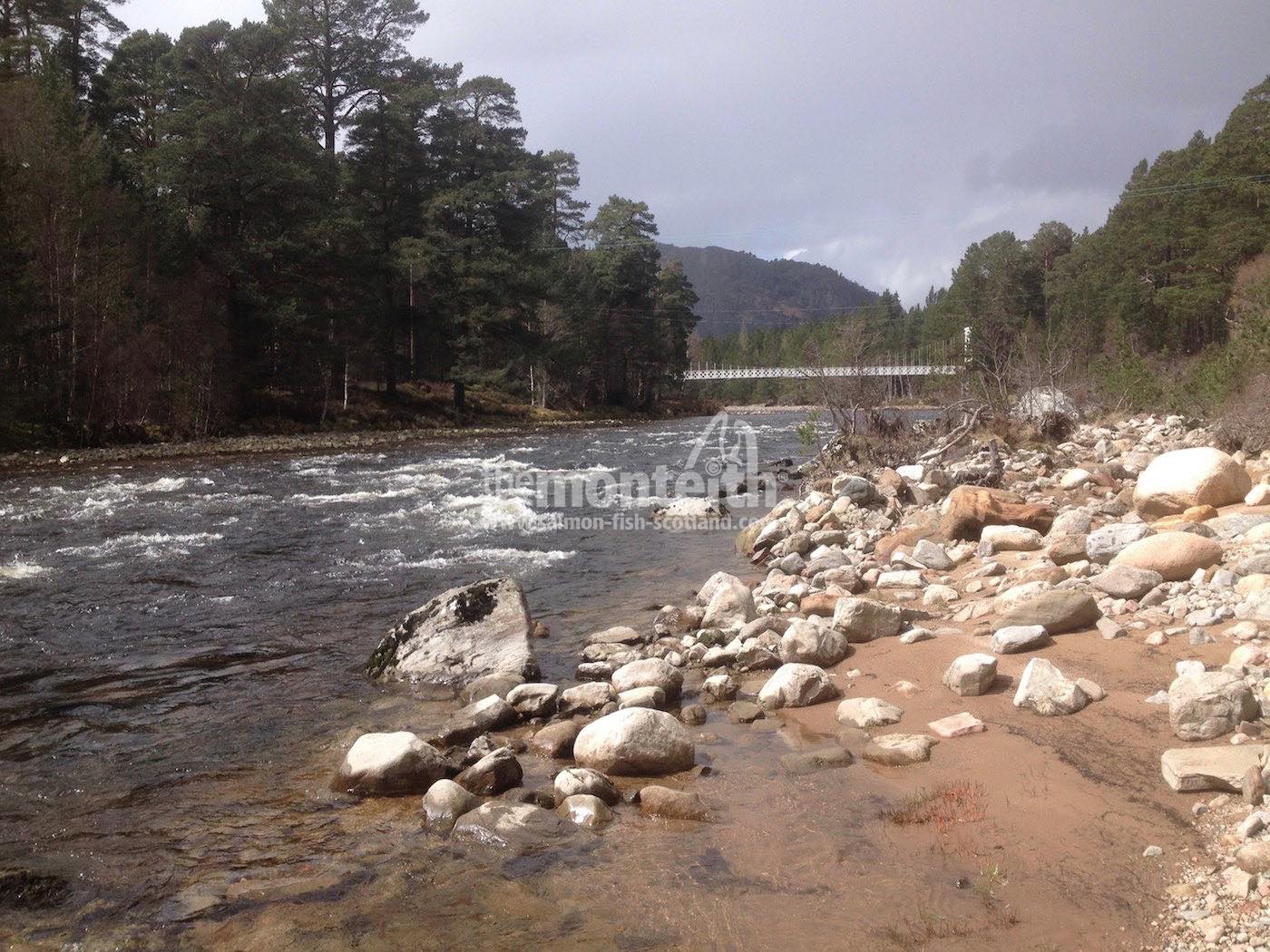 The River Dee has some exceptional salmon fly fishing water as you can see here on the lovely Crathie Beat near Braemar. Look at the beautiful fast flowing streamy water and boulder strewn riverbanks. A perfect Scottish salmon river stream for a salmon fishing break.