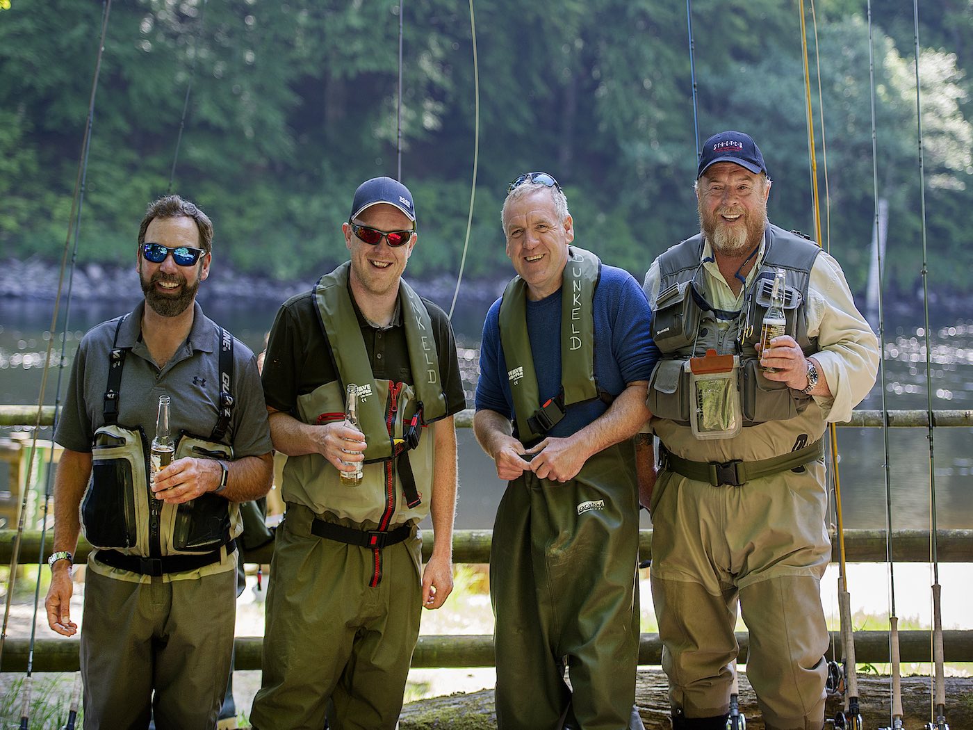 Here's a group of happy River Tay salmon guided fishers enjoying a beer at lunchtime after a proper chef prepared riverbank fishing hut lunch. The Scottish rivers make the perfect location for a fully catered salmon fishing event day.