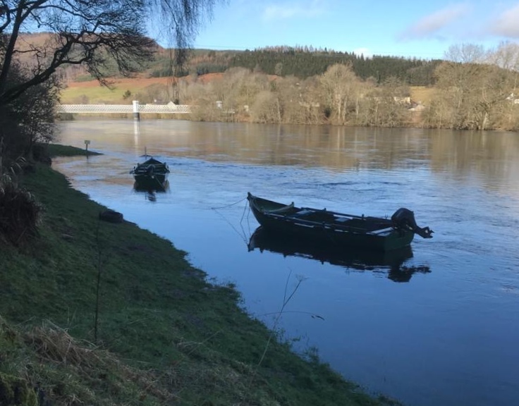 Here's 2 traditional River Tay 'coble' salmon fishing boats moored up on the Kinnaird Beat of the River Tay near Dunkeld. These boats add another dimension to the salmon fishing day and assist many salmon fishers to catch salmon on the River Tay each year. These boats are used frequently to give our salmon fishing holiday guests the best chance of catching salmon.