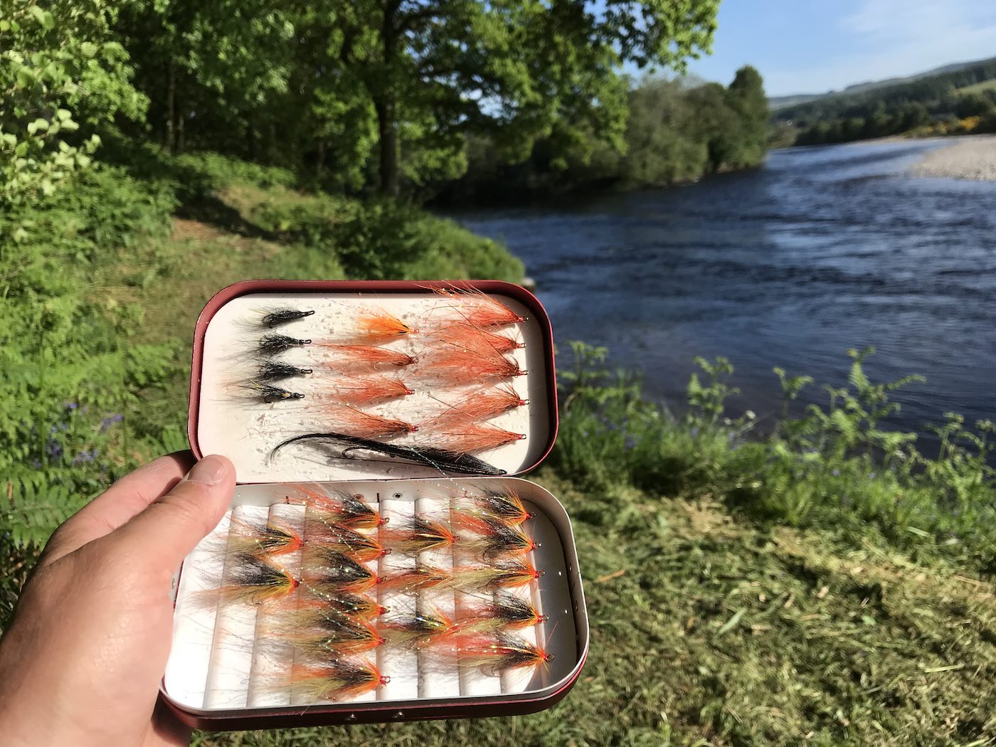 Here's a look at my own personal salmon fly box which includes my main 2 salmon fly patterns which are the Jock's Shrimp & Copperass salmon fly patterns. These 2 patterns have been responsible for over 80% of the salmon I've caught in the last 2 decades. This shot was taken at the River Tay/Tummel confluence near the Perthshire town of Pitlochry.