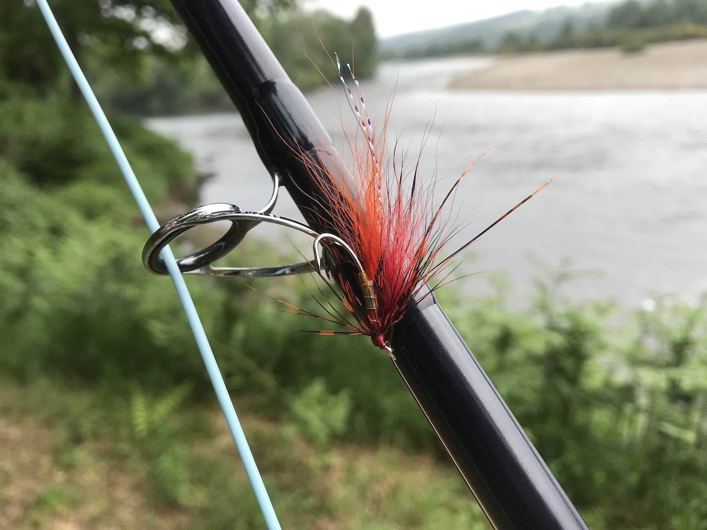 This perfect salmon fly was designed by myself on the River Tay 20 years ago and is an absolute salmon magnet when fished properly. Many experienced salmon anglers swear by the effectiveness of this pattern and it's sometimes wrongly referred to as the Newtyle Shrimp however it's proper registered name is the Jock's Shrimp as a credit to its creator. Here are the exact dressings for this deadly Scottish salmon fly pattern; 
Hook / Tube: as required
Thread / Silk: Uni Thread 6/0 or 8/0, Red
Tag / Butt: Oval silver as for Rib
Tail: Orange Arctic Fox or equivalent with pearl flashabou accent or mirage over, just 2 or perhaps 3 strands max.
Tying note: it's important to set the Tag / Butt in place first, this helps lift the Fox tail slightly, increases movement and helps avoid 
