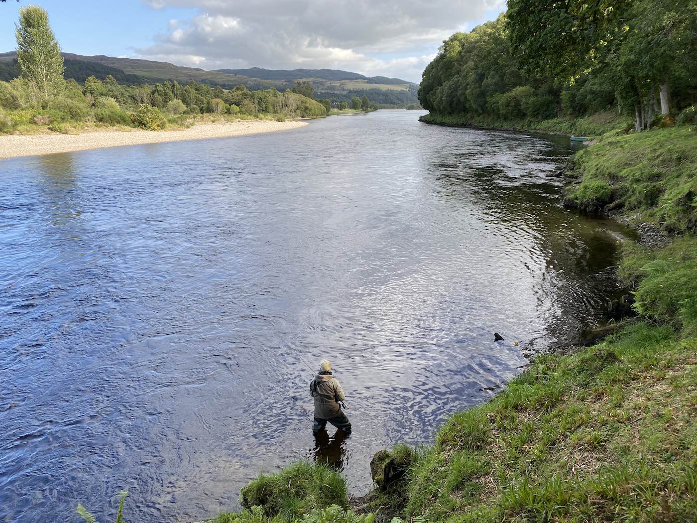 This is a great salmon pool on the middle River Tay at Kinnaird and is exactly positioned across from the confluence of the river Tay & Tummel. This Upper Kinnaird salmon beat is one of my most favourite beats on the River Tay I recall many special fishing memories here. This is the March Pool the salmon fishing angler is fly fishing and in the distance the Junction Pool and Ferry Stream Pool can also be seen.
