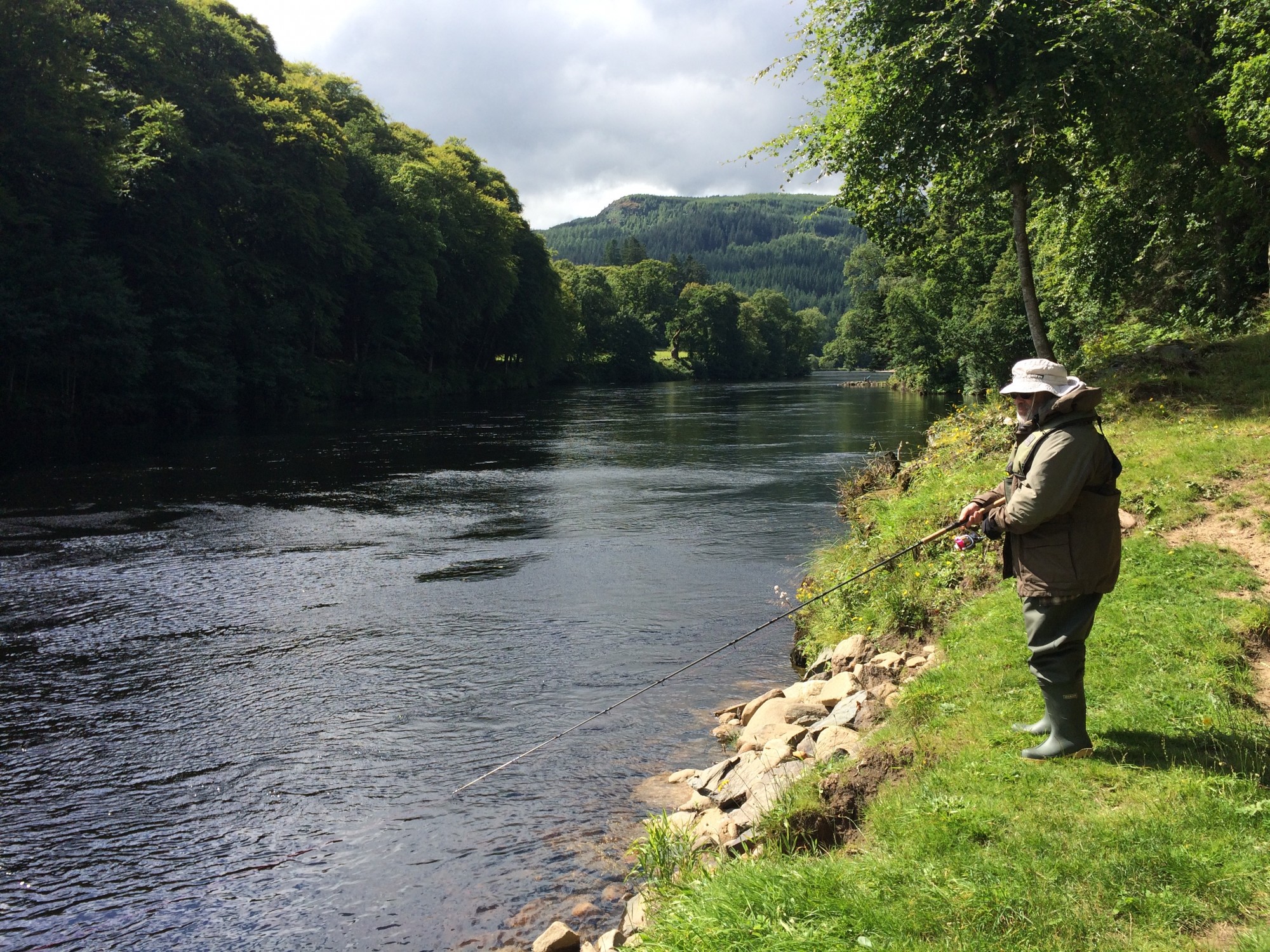 There's much skill and understanding involved in catching a Scottish salmon on a spinning rod and make no mistake about that fact. This visiting American salmon fisher was learning these spin fishing skills near Dunkeld on the River Tay during the low water of Summertime while under my supervision as his salmon guide.
