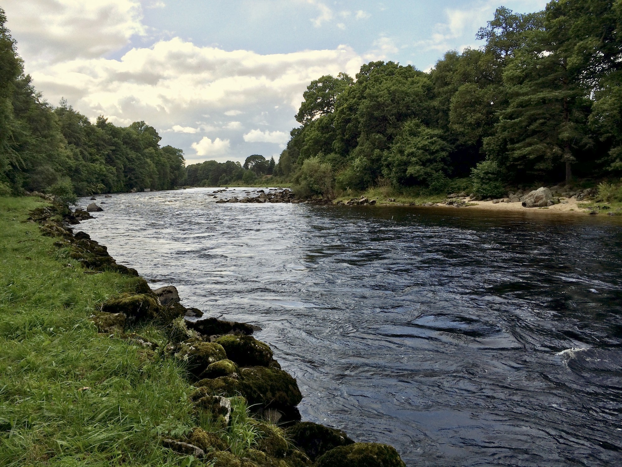 I took this shot of the beautiful Lower Blackhall salmon beat on the River Dee near Banchory. Our River Dee salmon fishing guides bring our Dee salmon fishing trip guests to this pool and they fish it from the opposite bank where you see the sand and then cast their salmon fly across to this riverbank letting the current swing the fly back across the river.