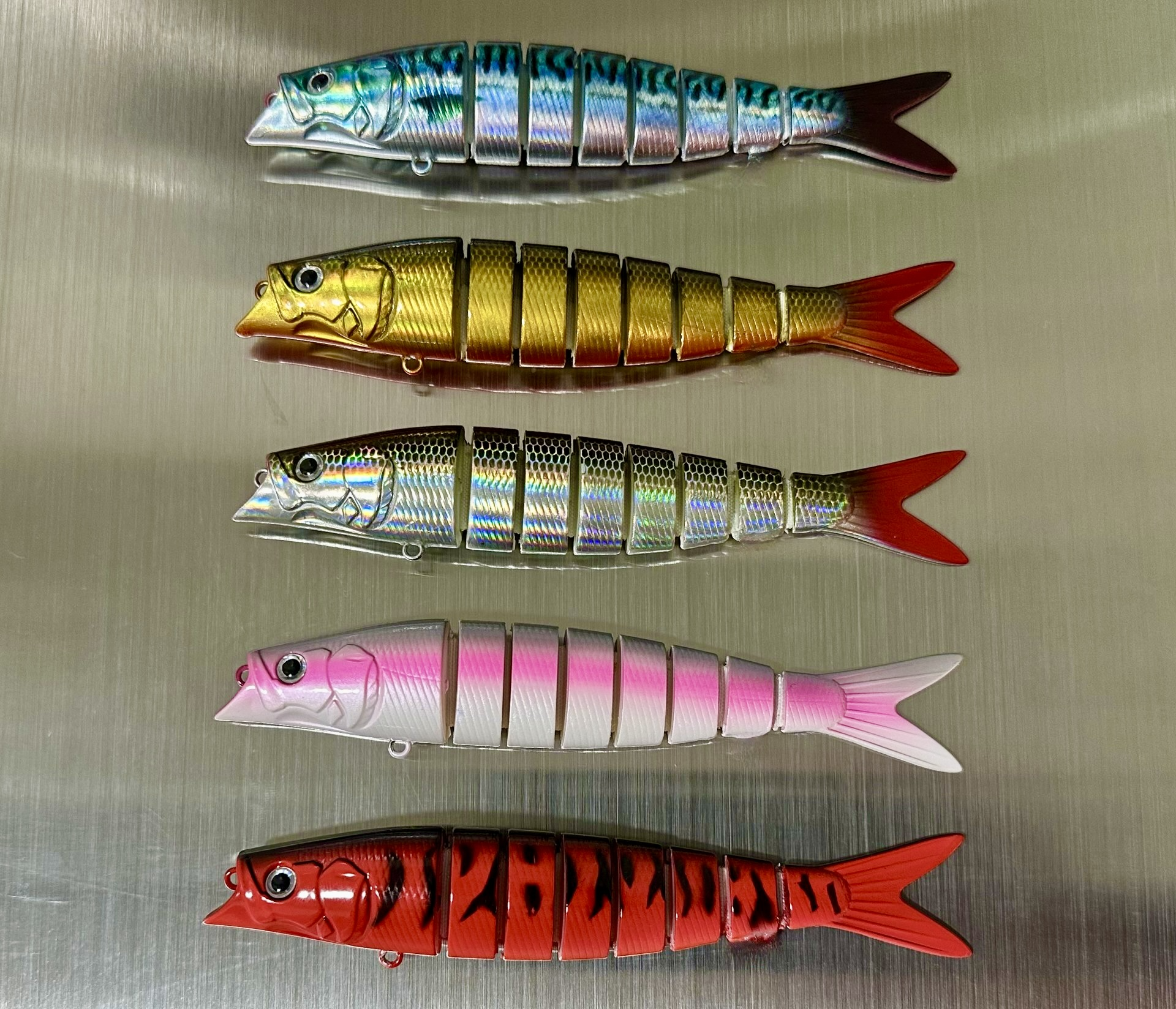 These are a carefully designed and coloured range of perfect new style salmon lures created by renowned Scottish salmon ghillie & River Tay boatman Jock Monteith. Salmon lures in general are seriously outdated and with reduced Atlantic salmon stock levels across the entire Northern Hemisphere more intelligent lures are required to maximise an angler's limited fishing time. These professionally designed 21g lures will significantly increase the chance of salmon action!